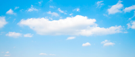 Blue sky with white fluffy cloud. Cumulus clouds background. Cloudscape morning sky. The concepts of freedom of life, never give up and positive though energy.
