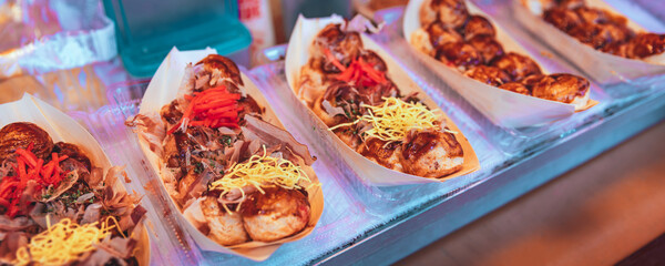 Takoyaki in streed food market at local travel festival in Tokyo japan