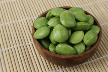 Delicious and Aromatic Parkia Speciosa (Petai) Beans in a Wooden Bowl