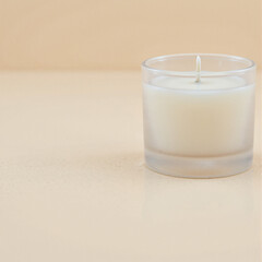 Minimalist ceramic candle in a frosted glass holder, placed on a soft beige background, calming and luxurious, perfect for home decor, relaxation, aromatherapy, or gifting