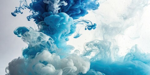 Fototapeta premium Swirling blue and white ink clouds float across a serene background, white ink, swirling motion, abstract art, dreamy atmosphere, blue ink