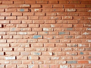 Obraz premium textured brick wall with multiple layers of old and peeling paint, wear, aged
