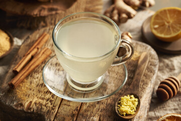 Herbal tea made of fresh ginger root with cinnamon sticks