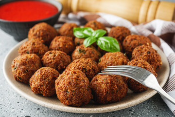 delicious traditional Italian meatballs polpette on a stone rustic background