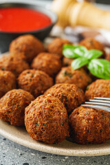 delicious traditional Italian meatballs polpette on a stone rustic background