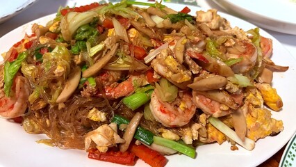 fried noodle and shrimps thai food style.
