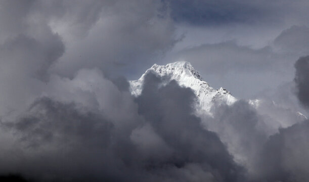 the clouds over the mountains