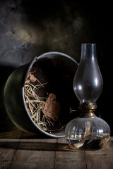 Old table kerosene lamp on a wooden table