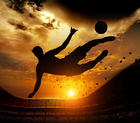Soccer Player Hitting the Ball in a Stadium - Silhouette
