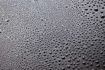 Water droplets with black background. Suitable for wallpaper cover design