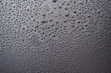 Water droplets with black background. Suitable for wallpaper background