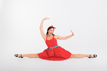 Photo of charming lovely choreographer dance in ballroom studio sit twine isolated on white color...
