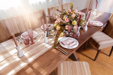 Festive table decorations, flowers and tableware, beautiful table setting for guests