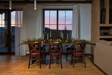 Decorative elements for festive events, home decorations. Festive table decorations, flowers and tableware