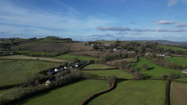 Seale-Hayne, Devon, England: DRONE VIEWS: The drone flies over farm fields towards the village of Seale-Hayne and its college, which was a former agriculture college operating from 1919 until 2005 (2)