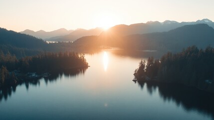 Fototapeta premium Serene Sunrise Over Calm Lake Surrounded by Majestic Mountains