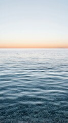 Fototapeta premium Elegant Dreamy pastel sunset with soft gradients of pink purple and peach blending over a calm ocean horizon peaceful and serene 