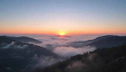 Obraz premium Sunrise Over a Misty Mountain Valley