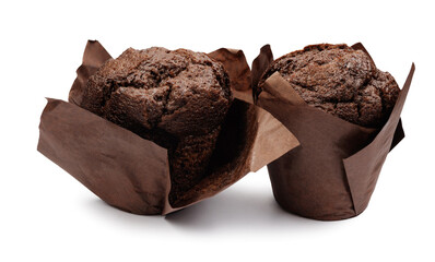 Two chocolate muffins in brown paper cup isolated on white background.