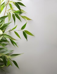 Fototapeta premium ライトグレーの落ち着いた背景に、春風に舞う柳の若葉が静けさと優雅さを感じさせるデザイン 
