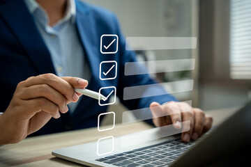 Business performance monitoring and evaluation concept, Take an assessment, Business man using...