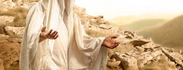 Man with open arms in a gesture of love and trust preaching and blessing against the background of a mountain. Sermon on the Mount Biblical scene, Holy Scriptures, New Testament, Christian religion