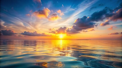 Obraz premium Serene Sunrise Seascape: Calm Ocean, Gentle Ripples, Peaceful Morning