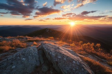 Naklejka premium serene mountain peak landscape during golden hour, with the sun casting a warm glow over the rugged terrain, evoking a sense of calm and relaxation in nature