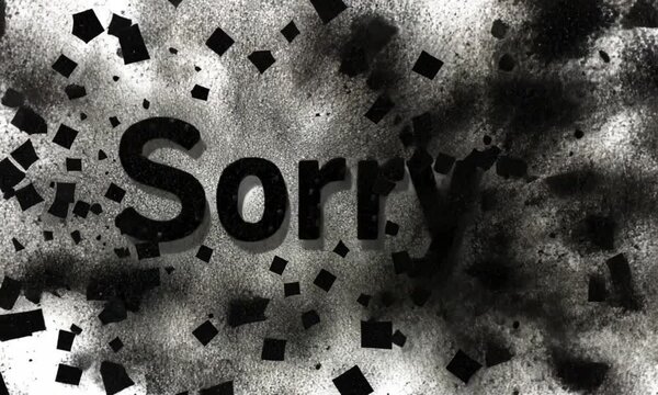 Bold 'Sorry!' Text on Gray Brush Stroke Background - Apology Message with Artistic Touch