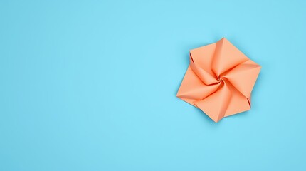 Minimalist abstract artwork with vibrant color contrast: smooth blue background, curled dual-tone paper (peach and orange), creating depth and dynamic movement.