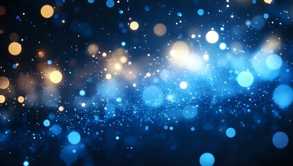 Obraz premium Magical blue and gold bokeh lights on dark background with glowing particles and sparkles create dreamy celestial atmosphere for festive designs.