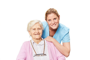 Pflegehilfe und Senior Frau zusammen