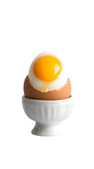 A soft boiled egg with a runny yolk, placed in an egg cup on a white table. Transparent background


