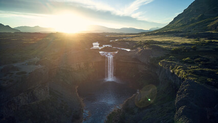 Spectacular view of Salto del Agrio waterfall – a vibrant cascade surrounded by rugged Patagonian landscapes
