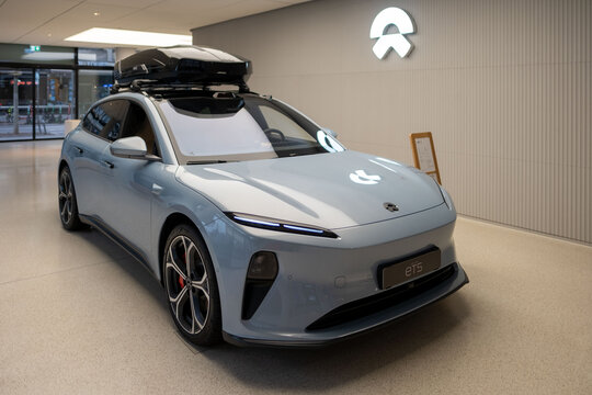 grey futuristic sleek ET5 NIO car, futuristic electric vehicle, showcases innovative design and aerodynamic features, zero-emission technology, Frankfurt - February 3, 2025