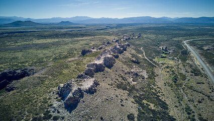 Majestic mountain peaks rising above the wilderness – a breathtaking display of nature’s grandeur.