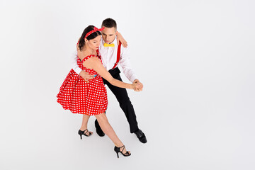 Photo of attractive charming couple duet dancers in dancehall dance rumba salsa isolated on white...