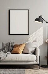 A modern living room with a light grey sofa, a black floor lamp, and a shelf on the right side of a picture frame. The poster frame on the wall is blank. 
