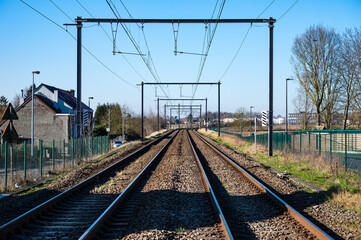 Double railway tracks of a local line at the Belgian countryside, Flemish Brabant, Belgium