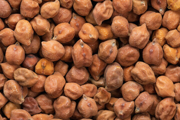 Close-up view of brown chickpea (kala chana). Background texture.