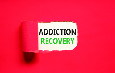 Addiction recovery symbol. Concept words Addiction recovery on beautiful white paper. Beautiful red table red background. Psychology addiction recovery concept. Copy space.