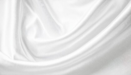Fototapeta premium luxurious white silk fabric with soft swirling folds, smooth texture, and gentle sheen, ideal for background