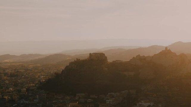 Aerial View of a Castle at  a Southern Coastal Town Roccella Ionica at Sunset