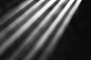 Fototapeta premium Spotlight or projector light beam with a textured look on a black background, and area reserved for text - backdrop image