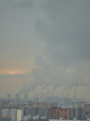 Smoke coming out of factory pipes pollutes the environment