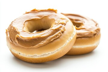 Fototapeta premium Delicious Peanut Butter Donuts on a Clean White Background