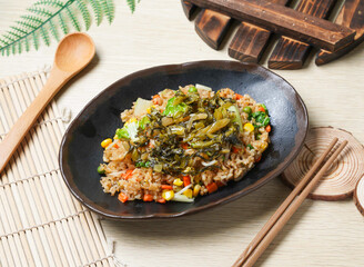 Sour Cabbage Fried Rice served in dish with chopsticks and spoon isolated background side view of taiwan food
