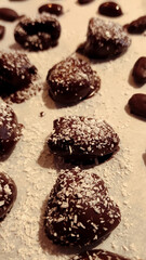 Chocolate pralines covered in coconut flakes, prepared for valentine's day celebration in prague