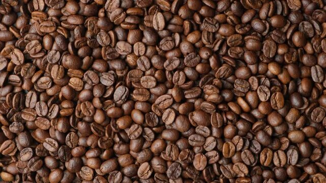 Rotating a caffeine-free decaf coffee beans close-up top view