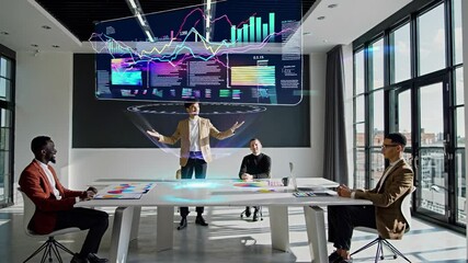 Diverse business team engaged in analyzing dynamic data visualizations projected in a modern office setting. Technology and innovation drive collaborative decision-making processes - Powered by Adobe